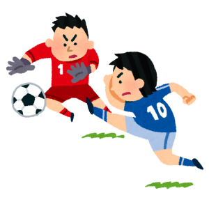 サッカーをする人