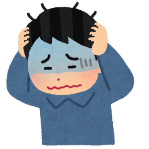 頭を抱える人