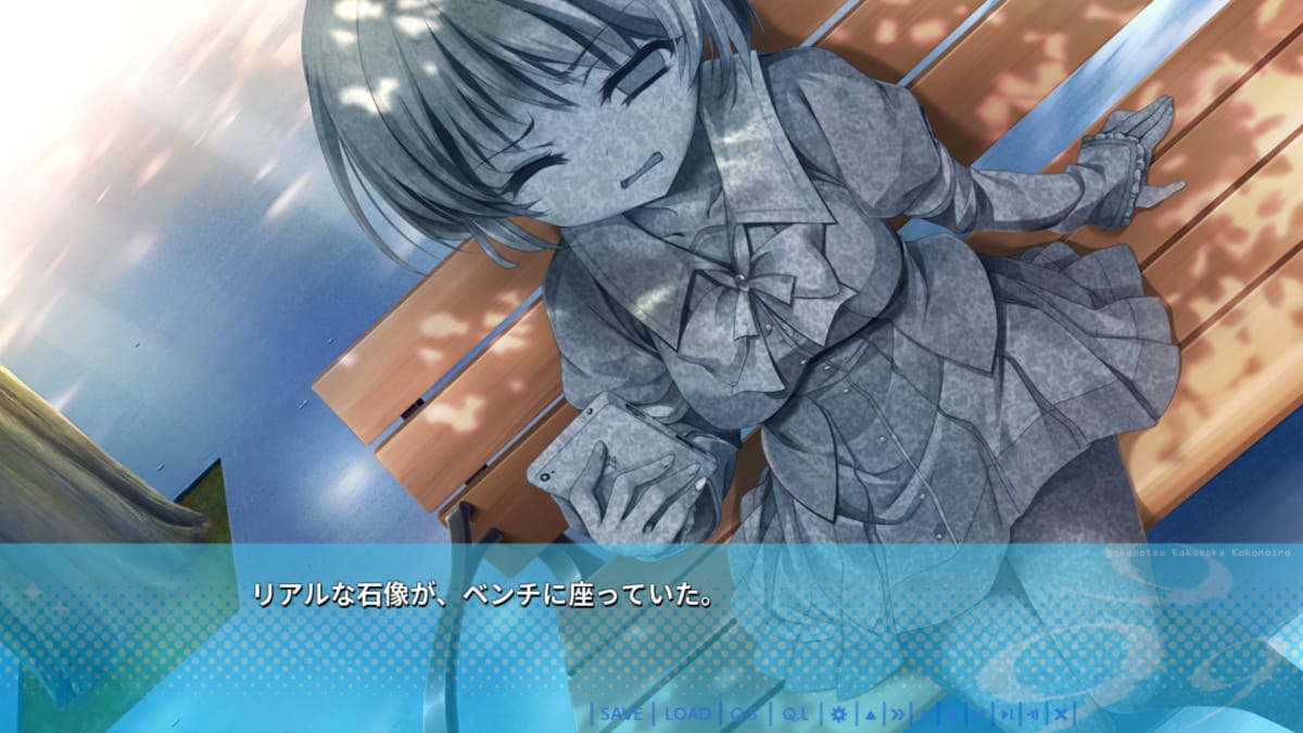 リアルな石像が、ベンチに座っていた。